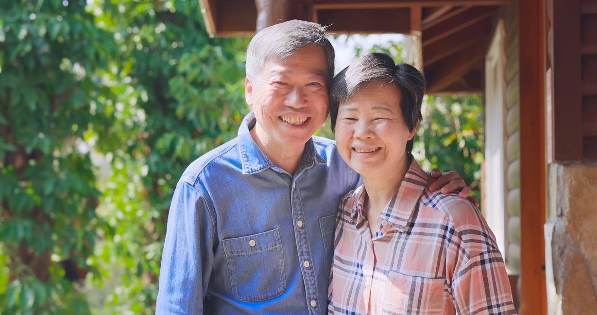 Asian Retired Couple Enjoy Travel